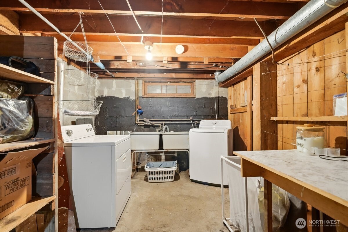 325 3rd Street Morton, WA 98356 - Photo 25 of 40 a kitchen with a stove and cabinets