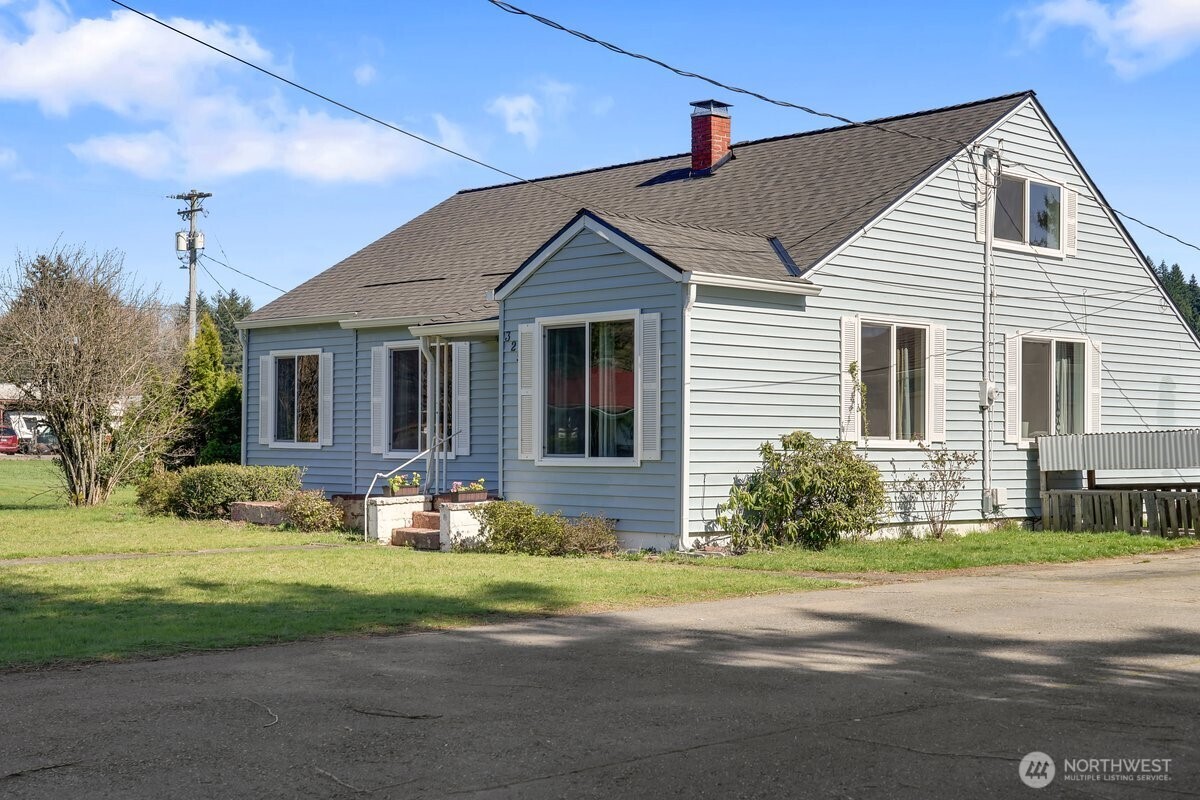 325 3rd Street Morton, WA 98356 - Photo 31 of 40 a front view of house with yard and green space