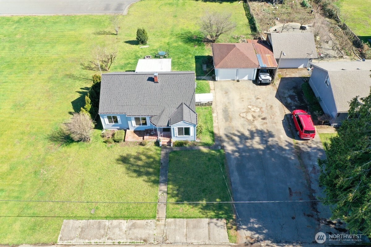325 3rd Street Morton, WA 98356 - Photo 39 of 40 an aerial view of residential houses with outdoor space and swimming pool