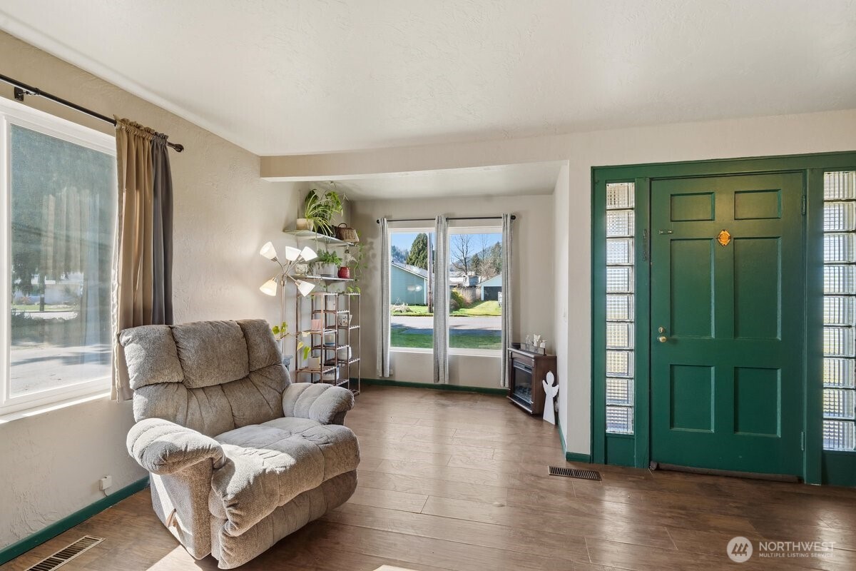 325 3rd Street Morton, WA 98356 - Photo 5 of 40 a living room with furniture and a window