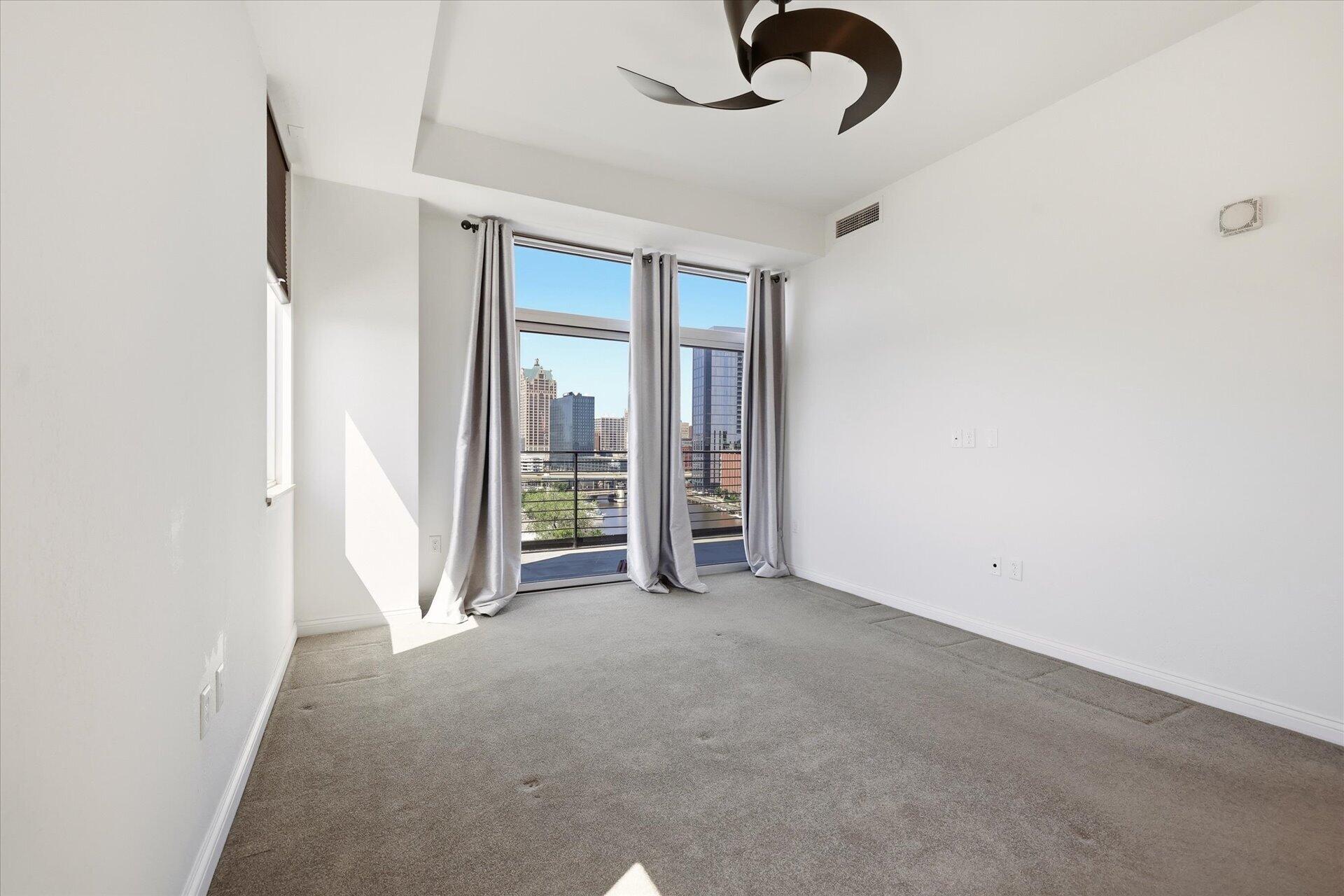 106 West Seeboth Street, Unit 920 Milwaukee, WI 53204 - Photo 17 of 51 Floor to ceiling windows