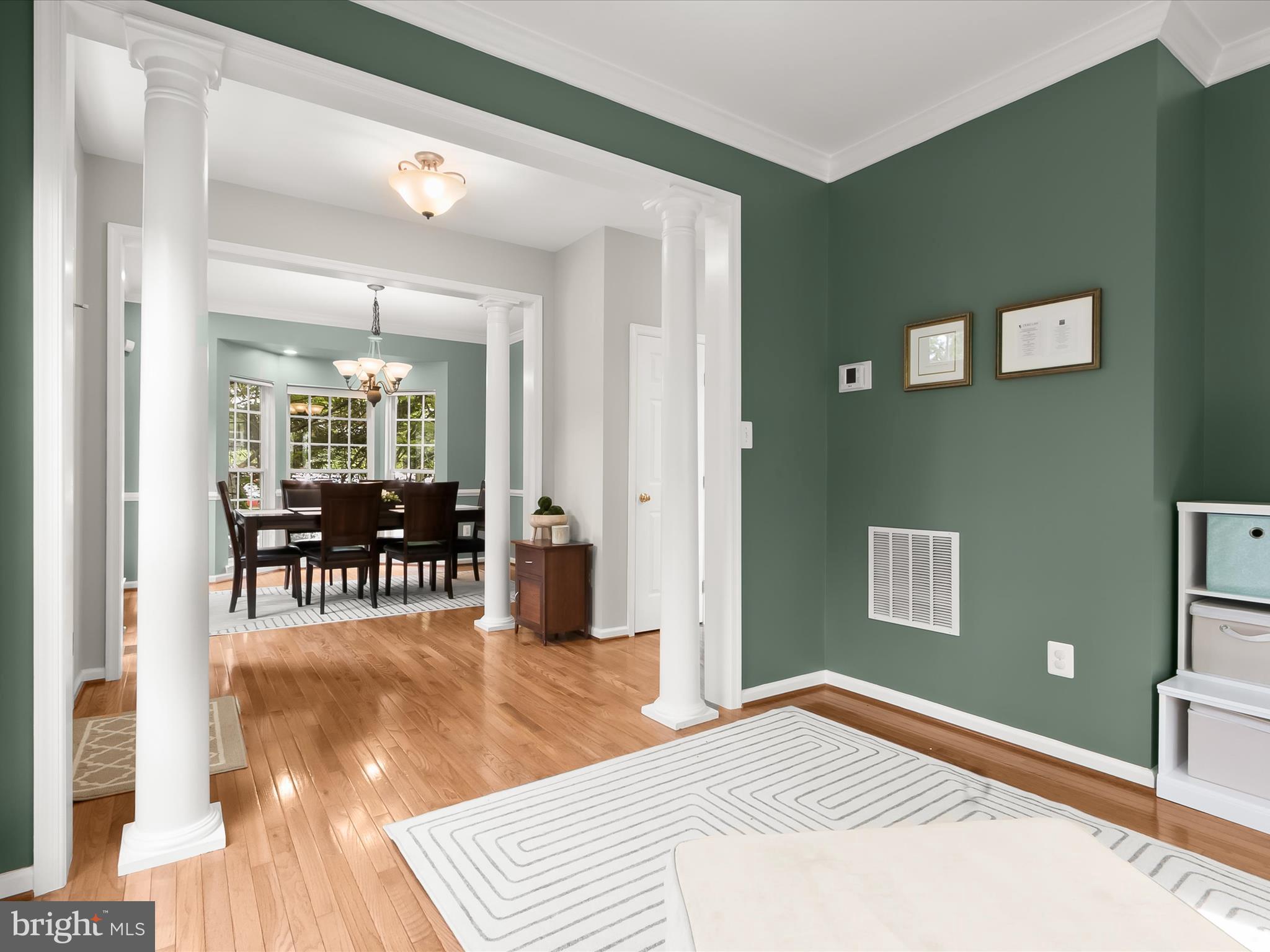 9808 Darcy Forest Drive Silver Spring, MD 20910 - Photo 11 of 82 a bedroom with a bed and table chair