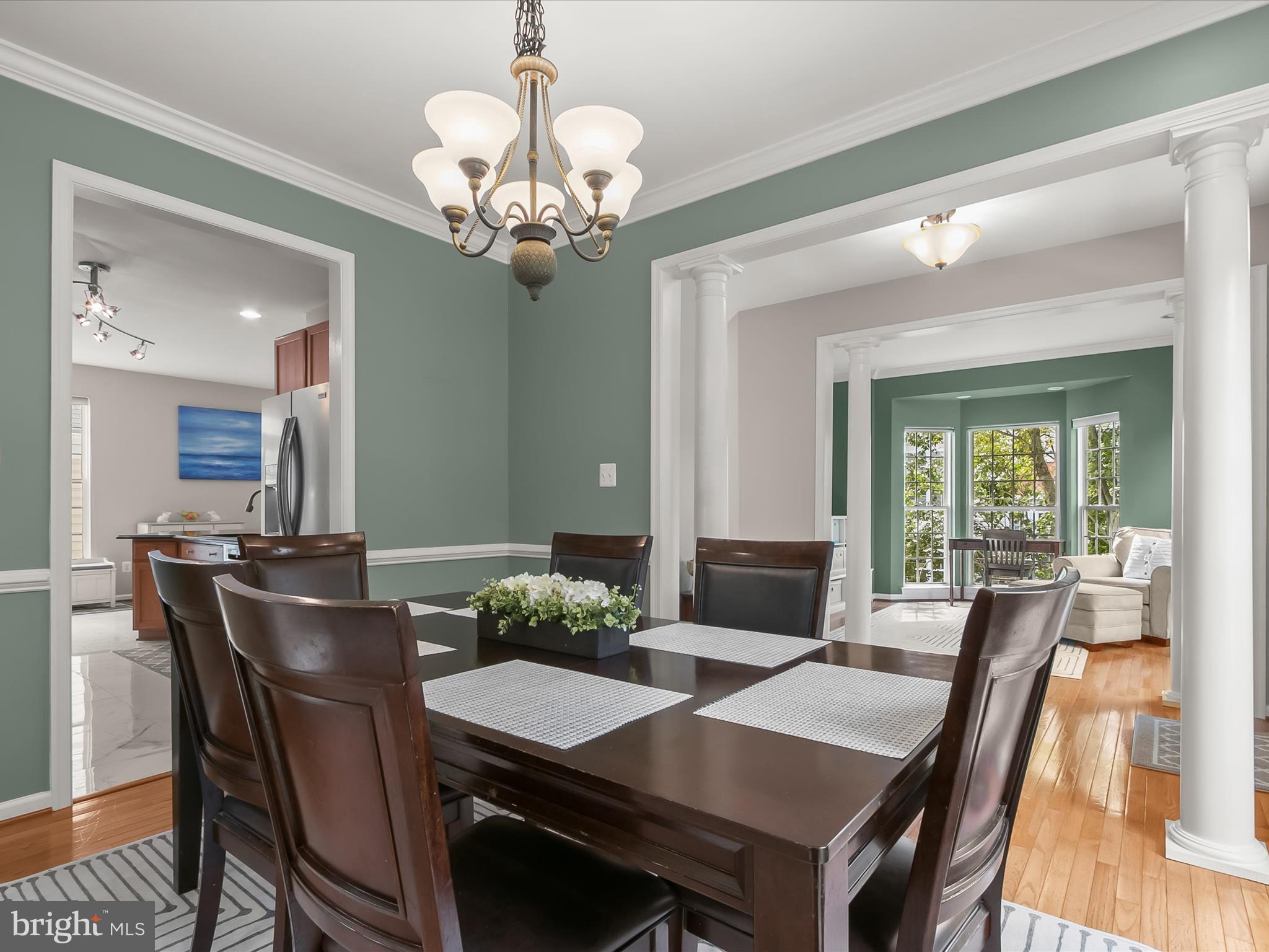 9808 Darcy Forest Drive Silver Spring, MD 20910 - Photo 13 of 82 a view of a dining room with furniture window and wooden floor