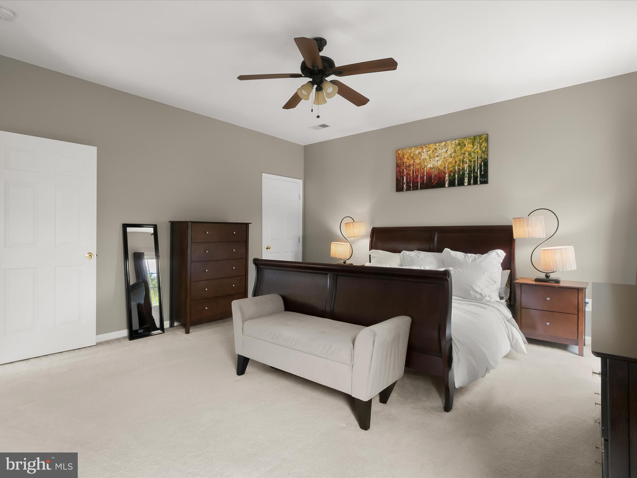 9808 Darcy Forest Drive Silver Spring, MD 20910 - Photo 29 of 82 a living room with furniture and a chandelier