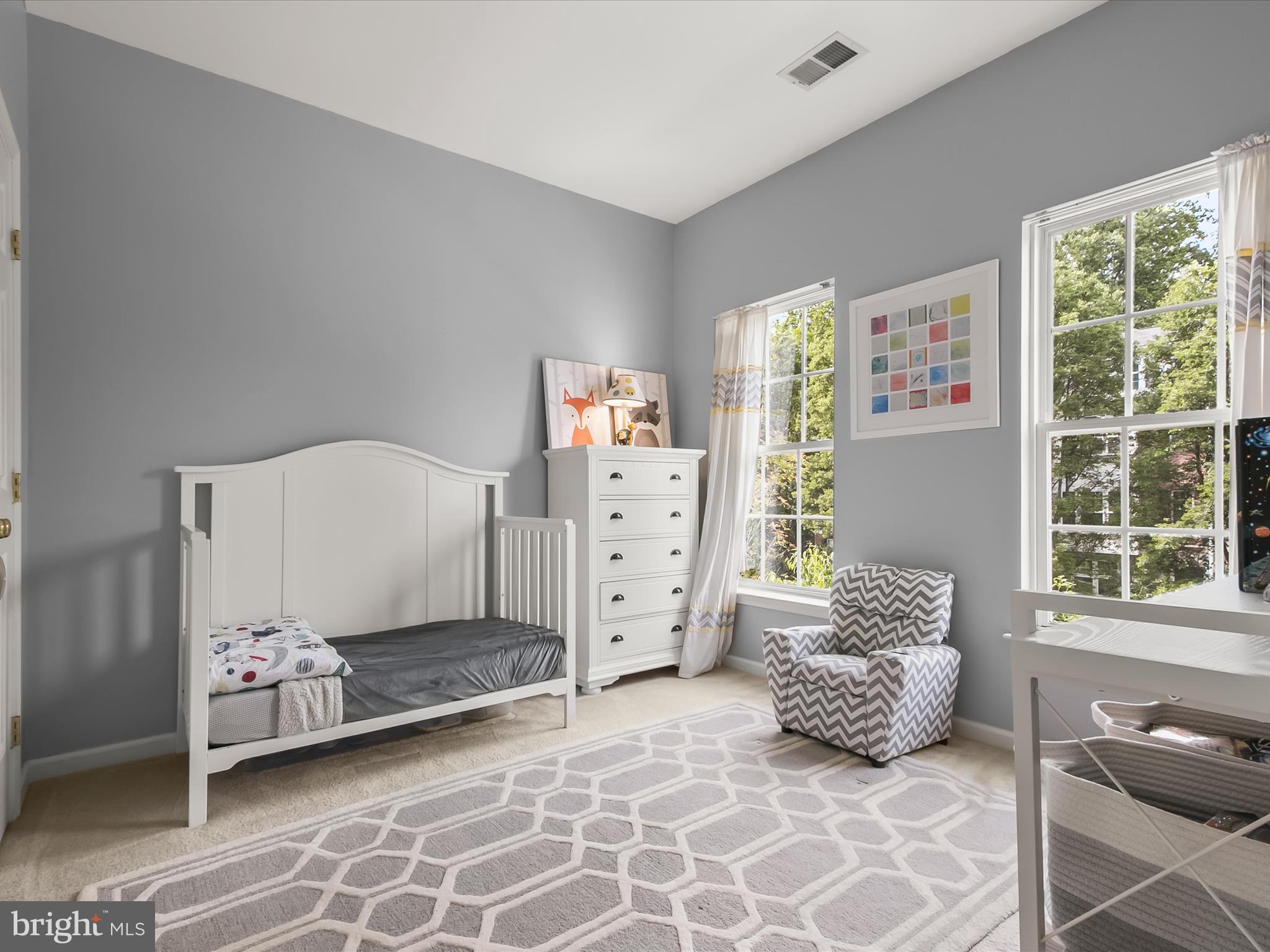 9808 Darcy Forest Drive Silver Spring, MD 20910 - Photo 40 of 82 a bedroom with furniture and a large window