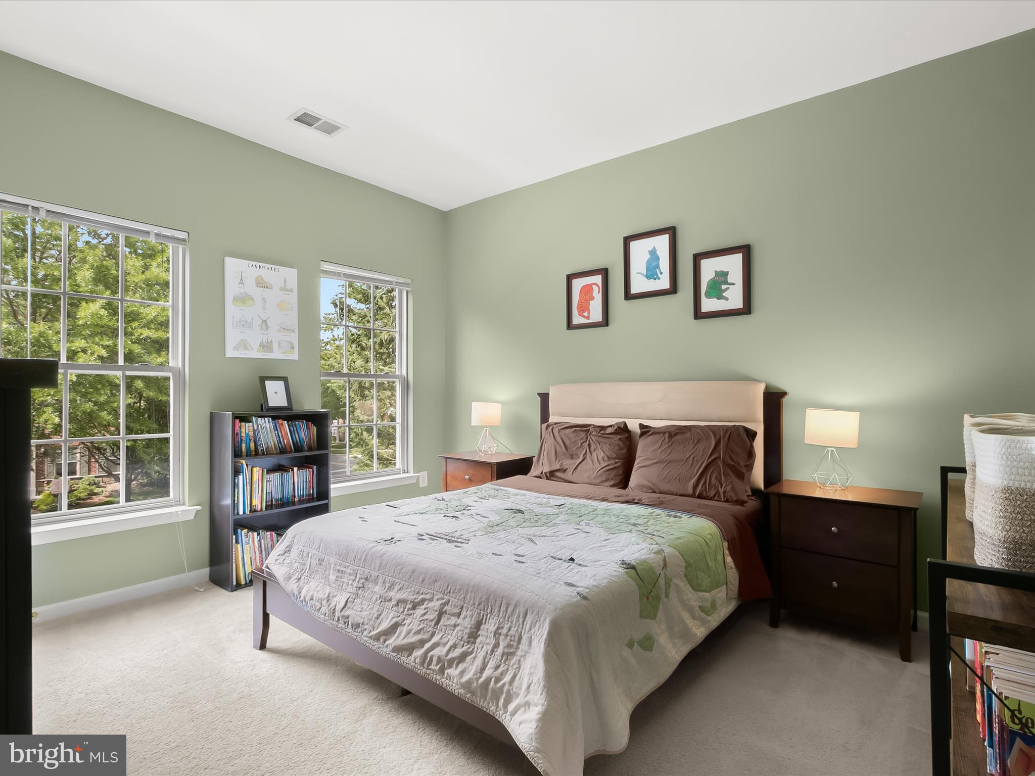9808 Darcy Forest Drive Silver Spring, MD 20910 - Photo 44 of 82 a bedroom with a bed and a large window