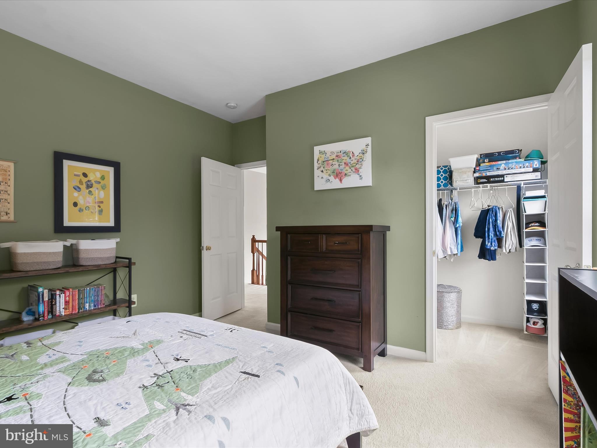 9808 Darcy Forest Drive Silver Spring, MD 20910 - Photo 46 of 82 a bed room with a bed and a television