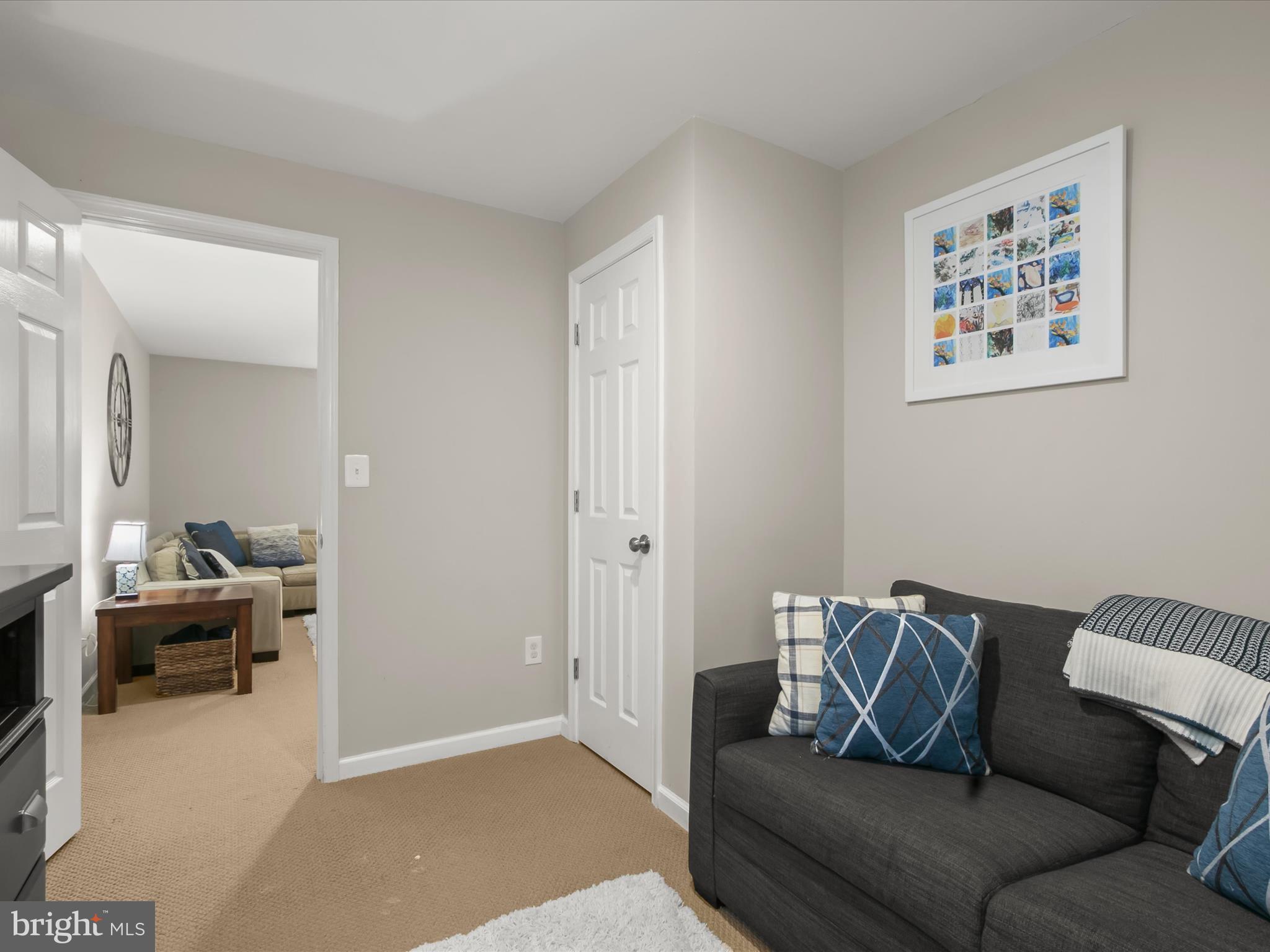 9808 Darcy Forest Drive Silver Spring, MD 20910 - Photo 55 of 82 a living room with furniture and a couch