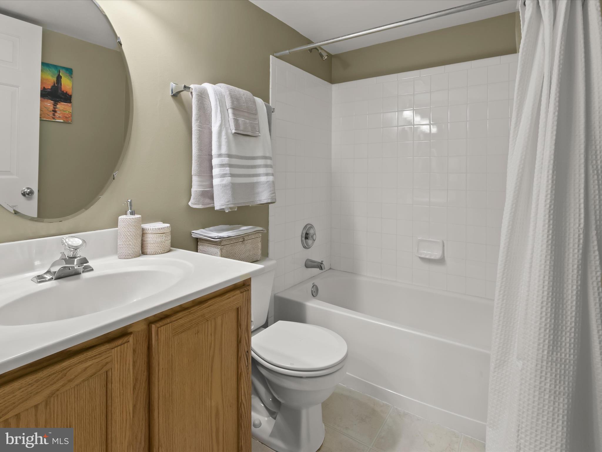 9808 Darcy Forest Drive Silver Spring, MD 20910 - Photo 59 of 82 a bathroom with a sink toilet and shower