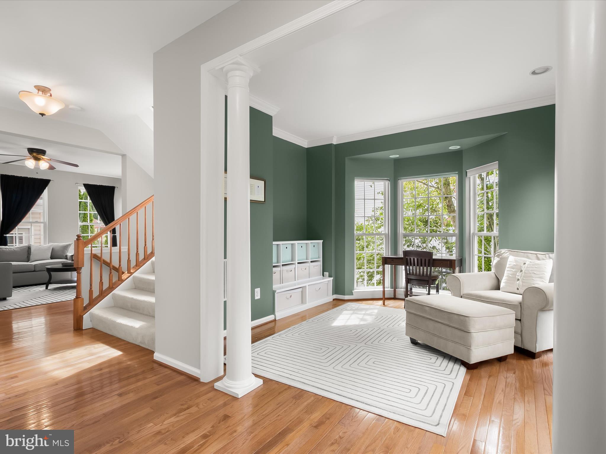 9808 Darcy Forest Drive Silver Spring, MD 20910 - Photo 8 of 82 a living room with furniture and a large window
