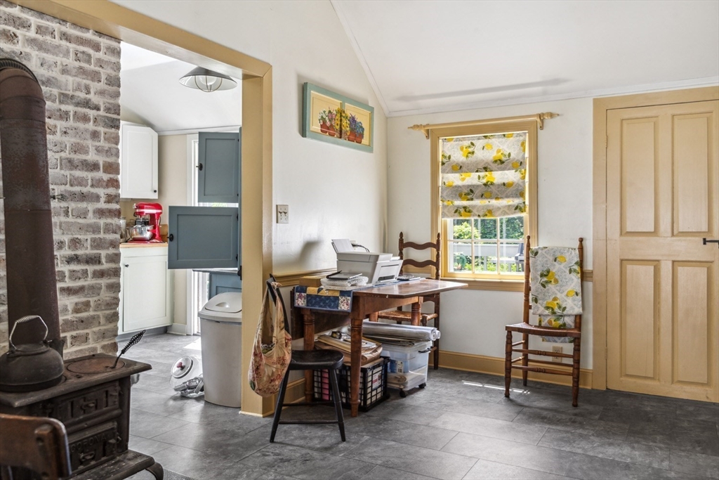 1251 County Road Bourne, MA 02534 - Photo 6 of 42 a workspace with furniture and window