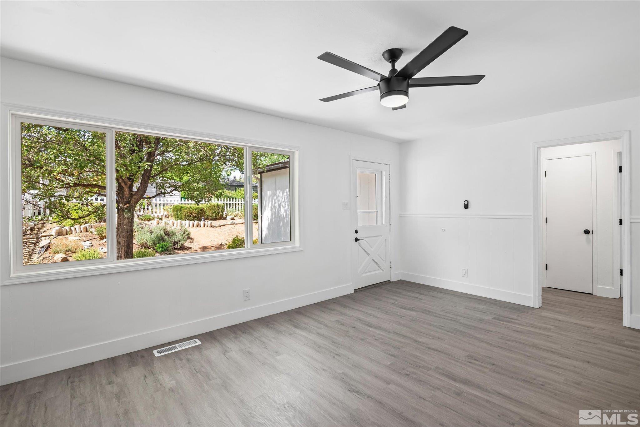 1760 Grandview Avenue Reno, NV 89503 - Photo 11 of 35 wooden floor in an empty room with a window