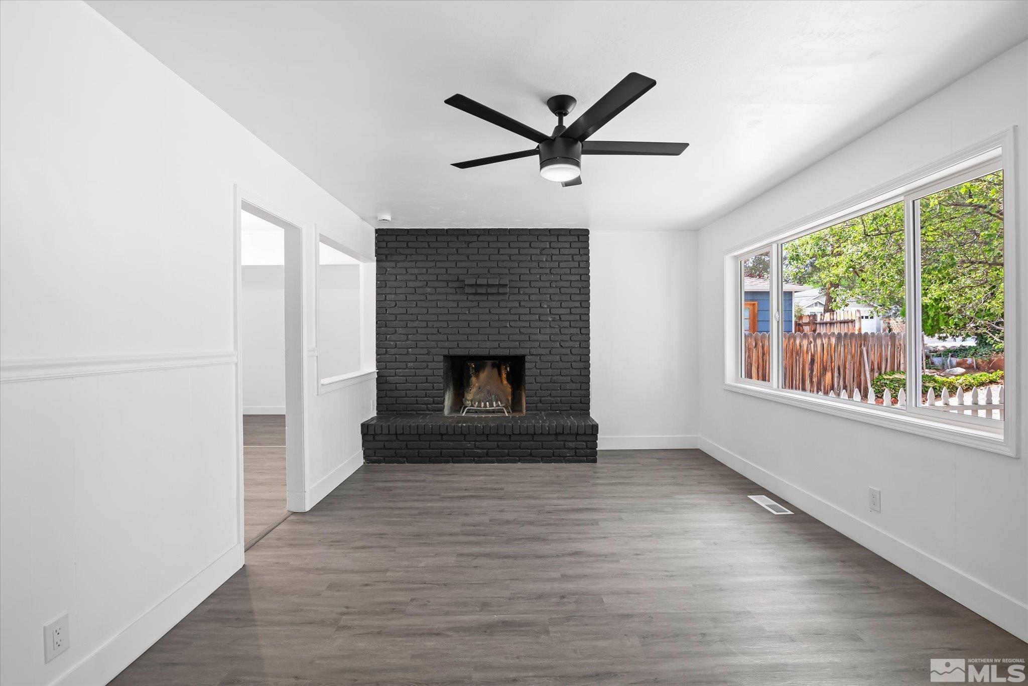 1760 Grandview Avenue Reno, NV 89503 - Photo 12 of 35 a view of a room window and wooden floor