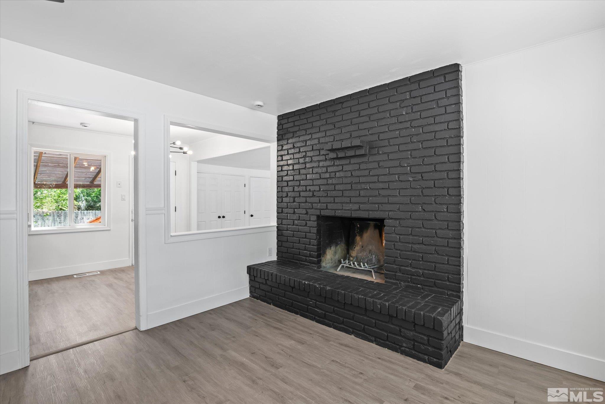 1760 Grandview Avenue Reno, NV 89503 - Photo 13 of 35 a living room with furniture and a fireplace
