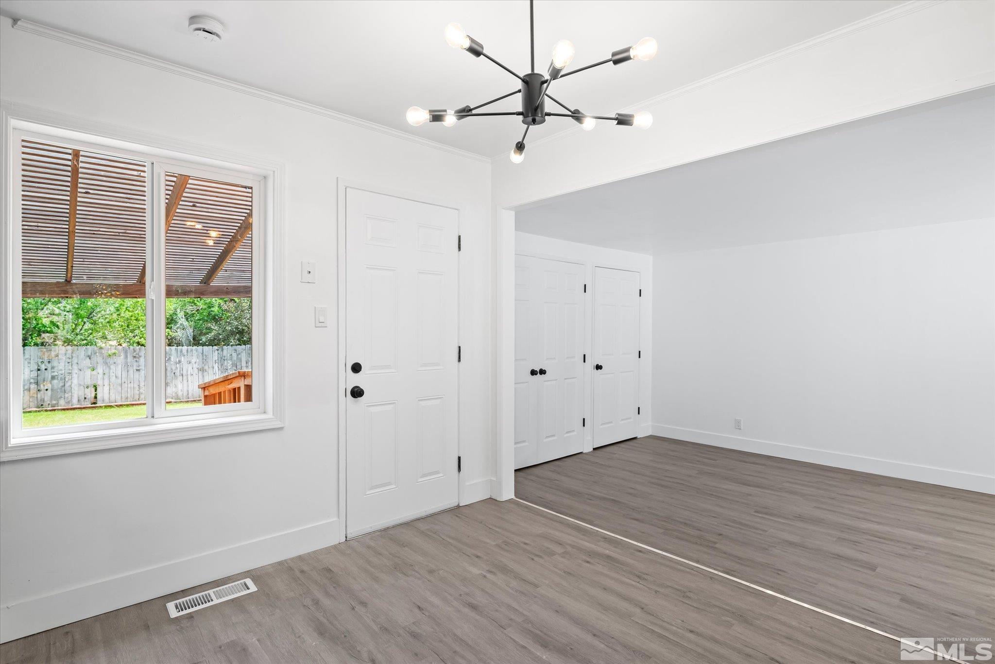 1760 Grandview Avenue Reno, NV 89503 - Photo 19 of 35 wooden floor in an empty room with a window