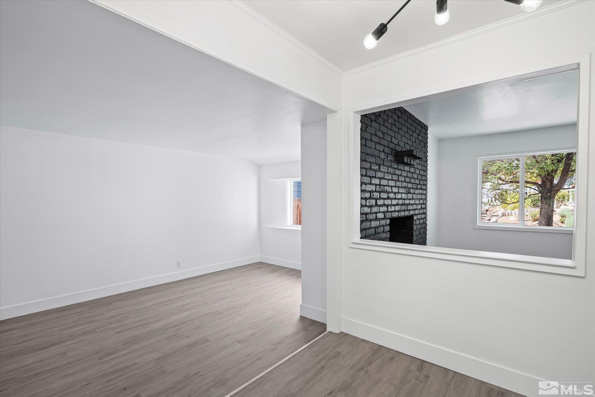 1760 Grandview Avenue Reno, NV 89503 - Photo 20 of 35 wooden floor in an empty room with a window