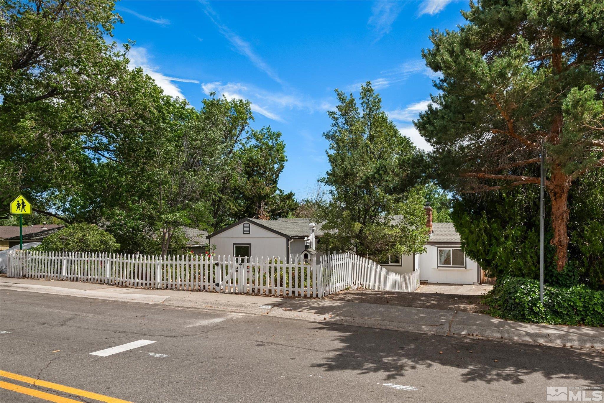 1760 Grandview Avenue Reno, NV 89503 - Photo 2 of 35 a view of a wooden house with a street