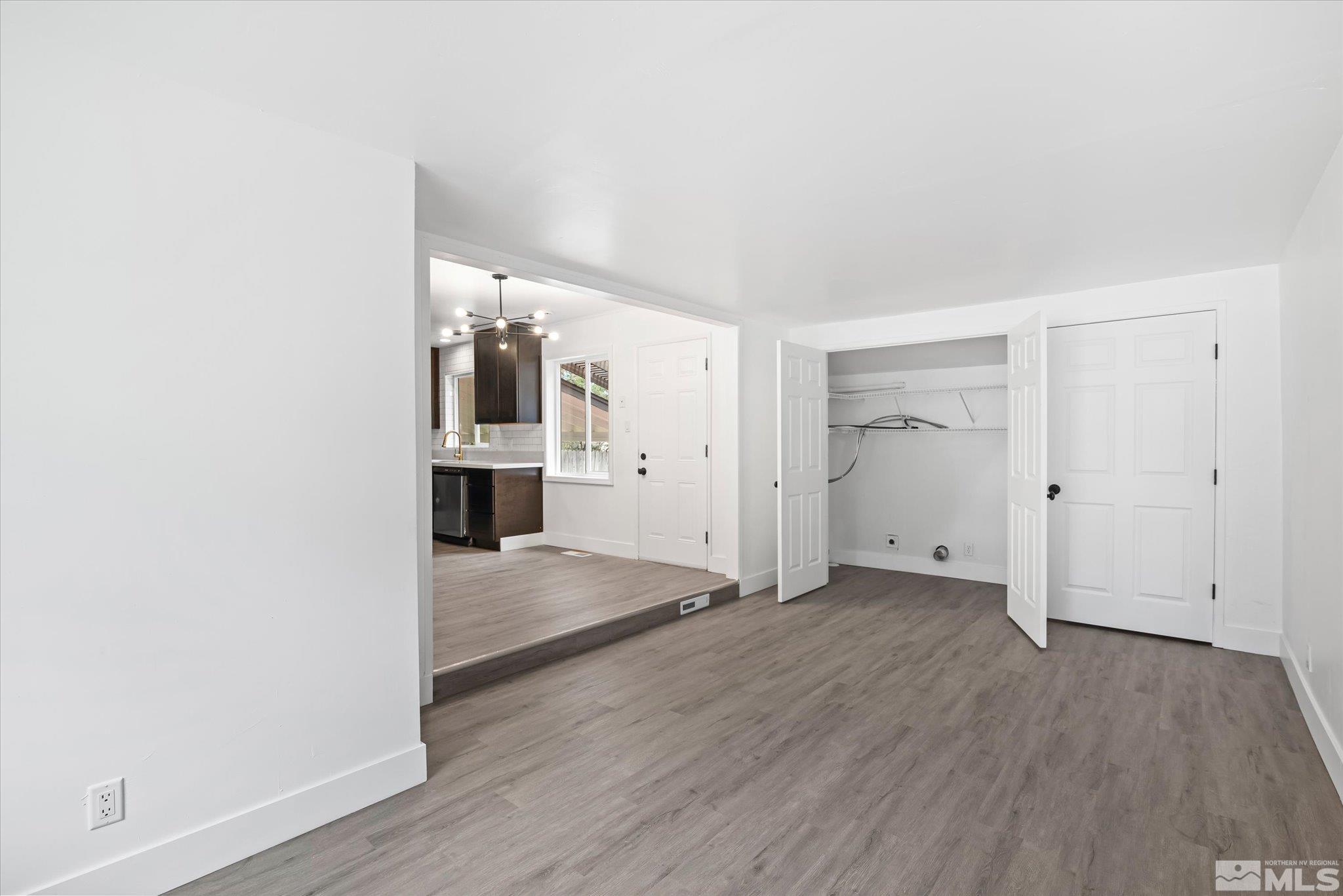 1760 Grandview Avenue Reno, NV 89503 - Photo 23 of 35 an empty room with wooden floor and windows
