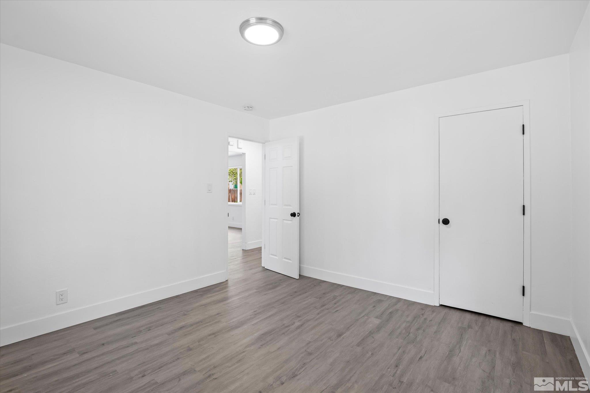 1760 Grandview Avenue Reno, NV 89503 - Photo 26 of 35 a view of an empty room with wooden floor