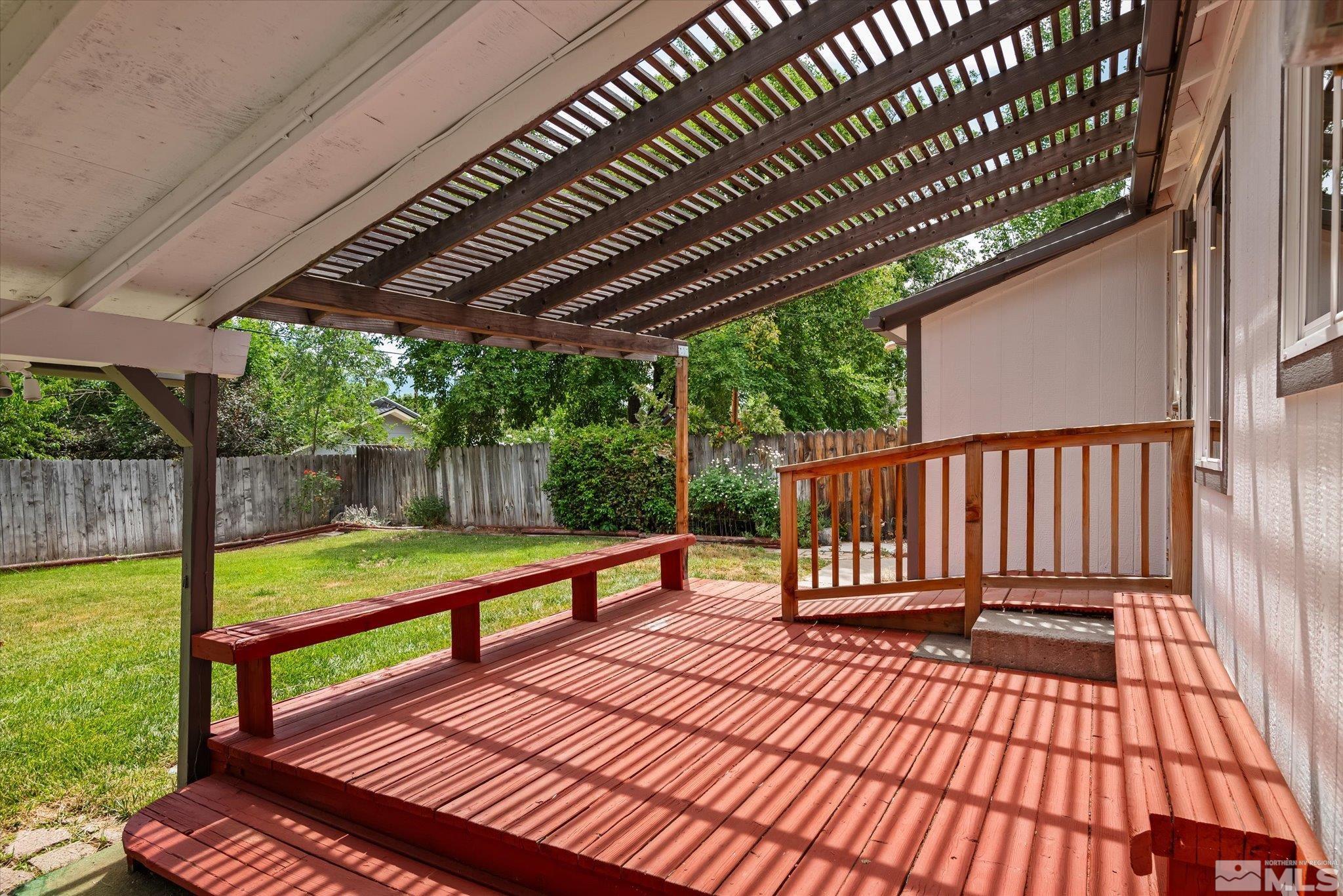 1760 Grandview Avenue Reno, NV 89503 - Photo 35 of 35 a view of a roof deck with wooden floor and fence