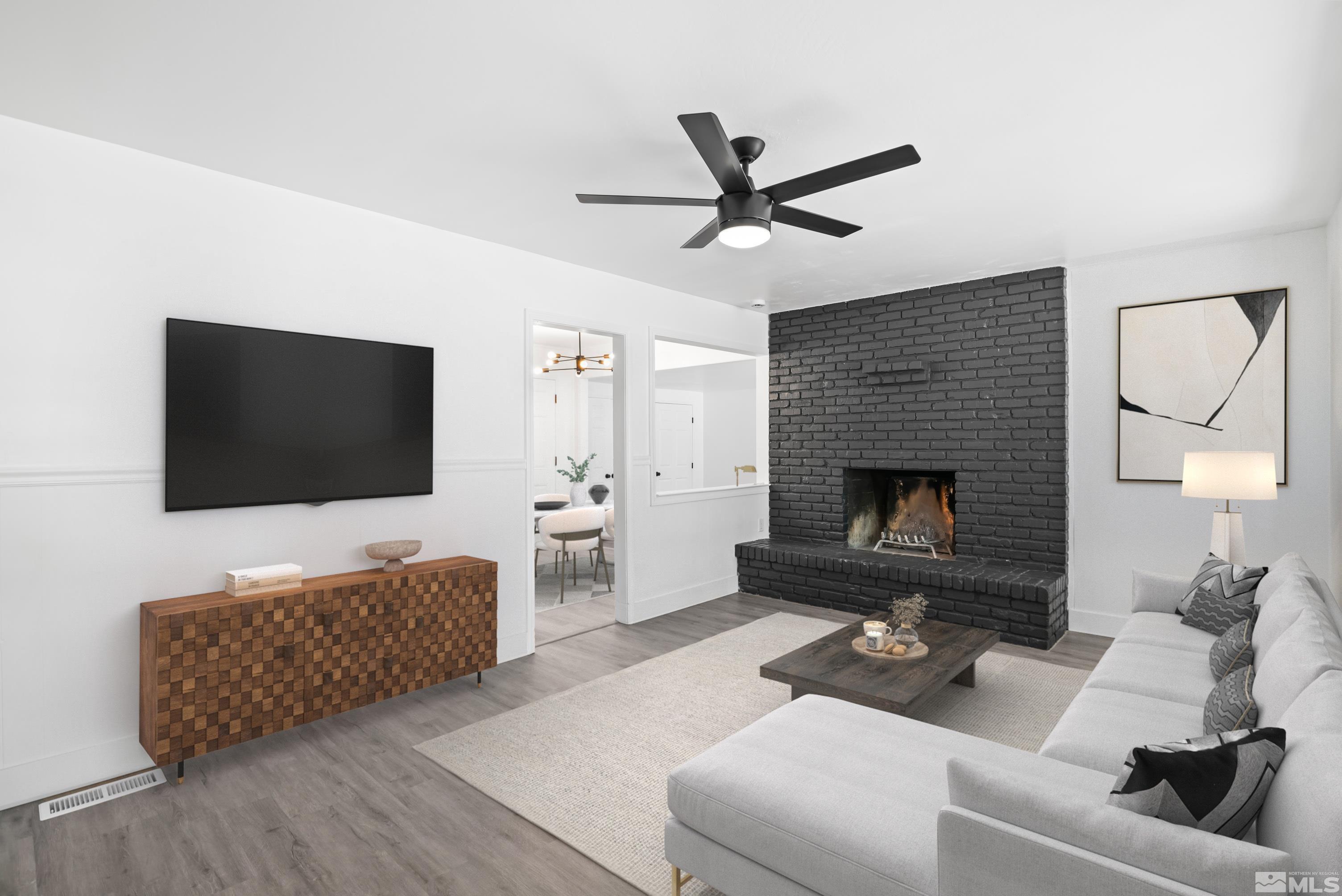 1760 Grandview Avenue Reno, NV 89503 - Photo 4 of 35 a living room with furniture and a flat screen tv