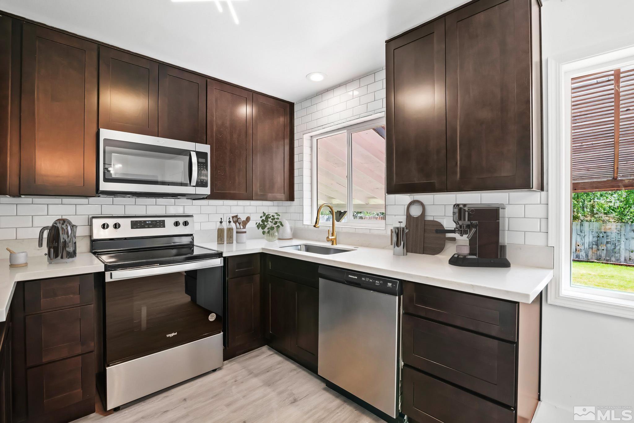 1760 Grandview Avenue Reno, NV 89503 - Photo 7 of 35 a kitchen with a sink cabinets and stainless steel appliances