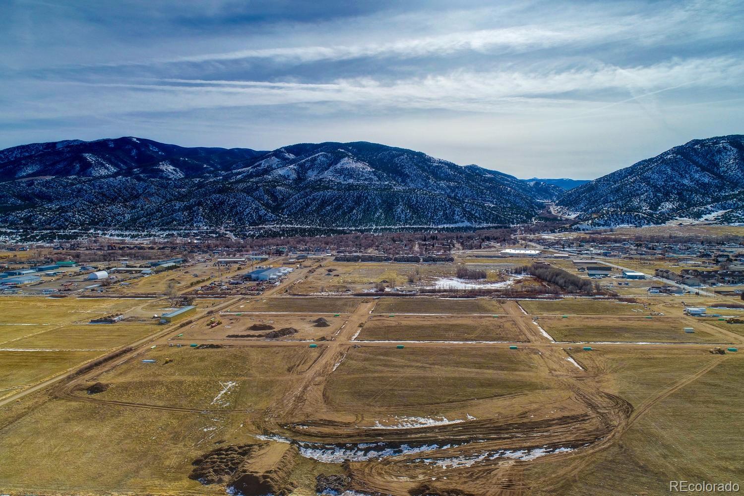 Block Block 5th Poncha Springs Poncha Springs, CO 81201 - Photo 7 of 9 a view of a swimming pool with a mountain