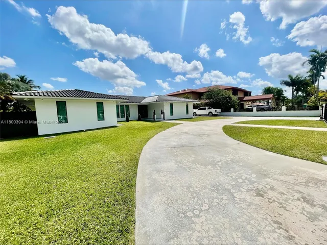 a view of a house with a swimming pool