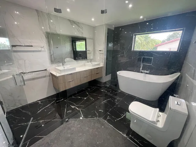 a view of a backyard with a garden