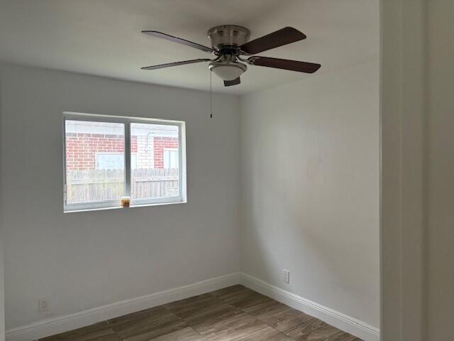 958 West 3rd Street Riviera Beach, FL 33404 - Photo 6 of 10 an empty room with a window