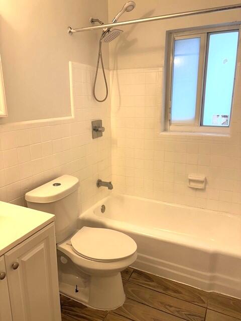 958 West 3rd Street Riviera Beach, FL 33404 - Photo 8 of 10 a bathroom with a toilet and a shower