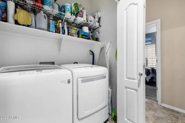 a utility room with dryer and washer