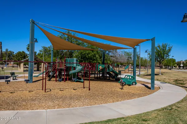 a view of a yard with a slide