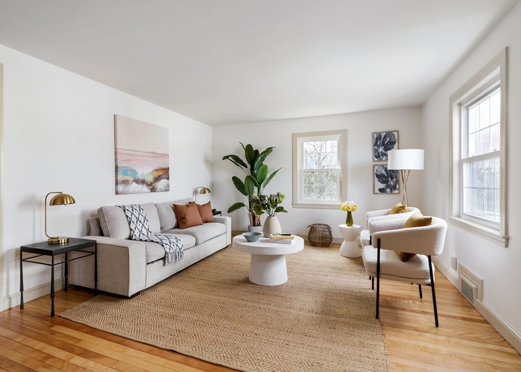 18 Kenilworth Road Arlington, MA 02476 - Photo 3 of 26 a living room with furniture lamp and window