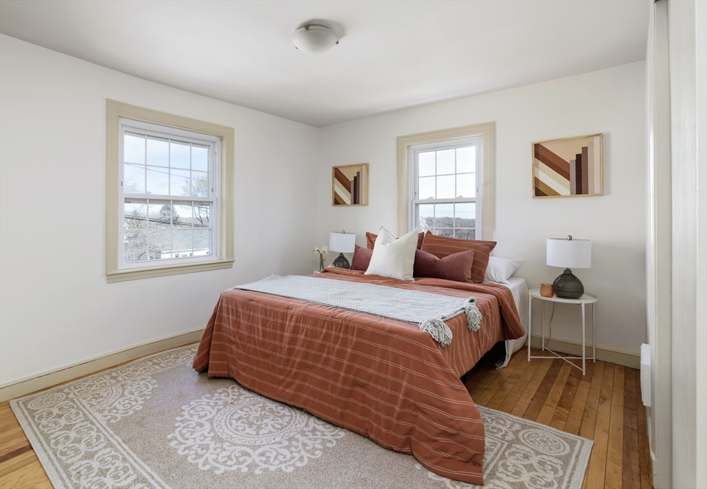 18 Kenilworth Road Arlington, MA 02476 - Photo 10 of 26 a bedroom with a bed and a window