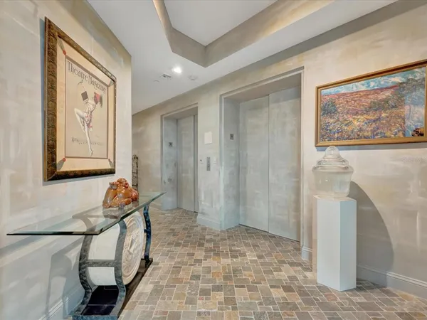 a bathroom with a sink a mirror and a shower