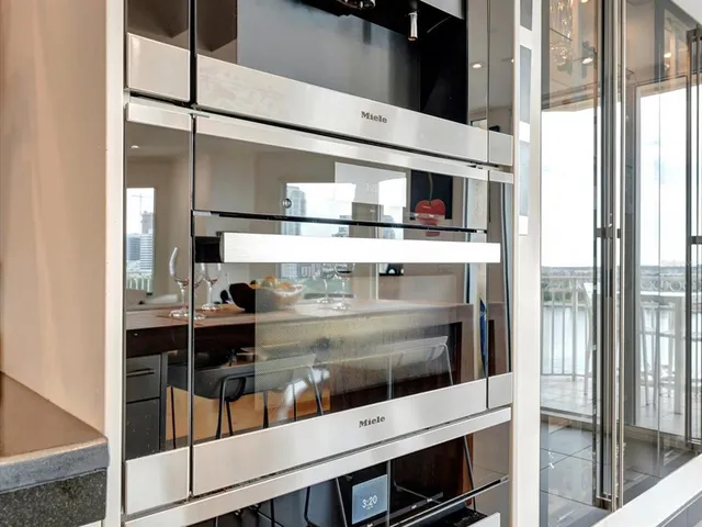 a picture of a glass door with a hallway