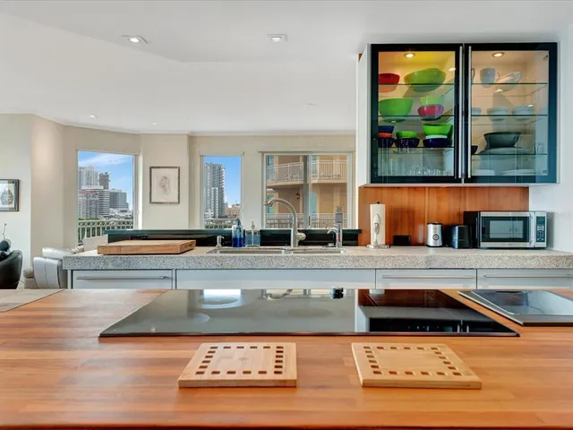 a large bathroom with a large window and a counter space