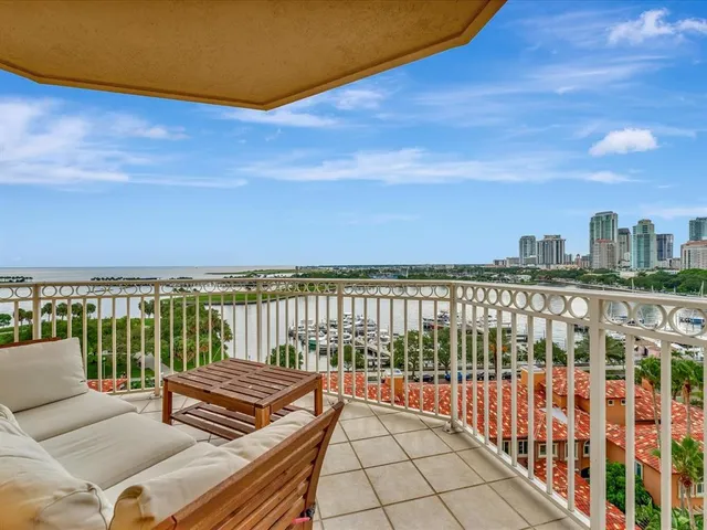 a view of a balcony with city view