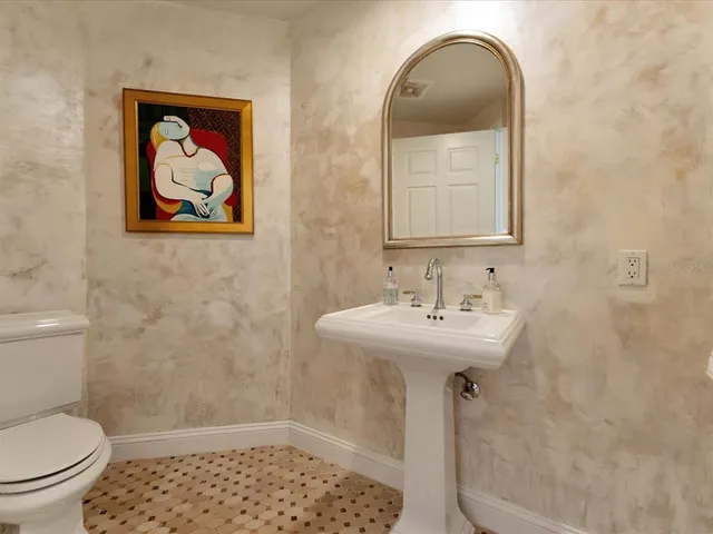 a bathroom with a sink and a toilet