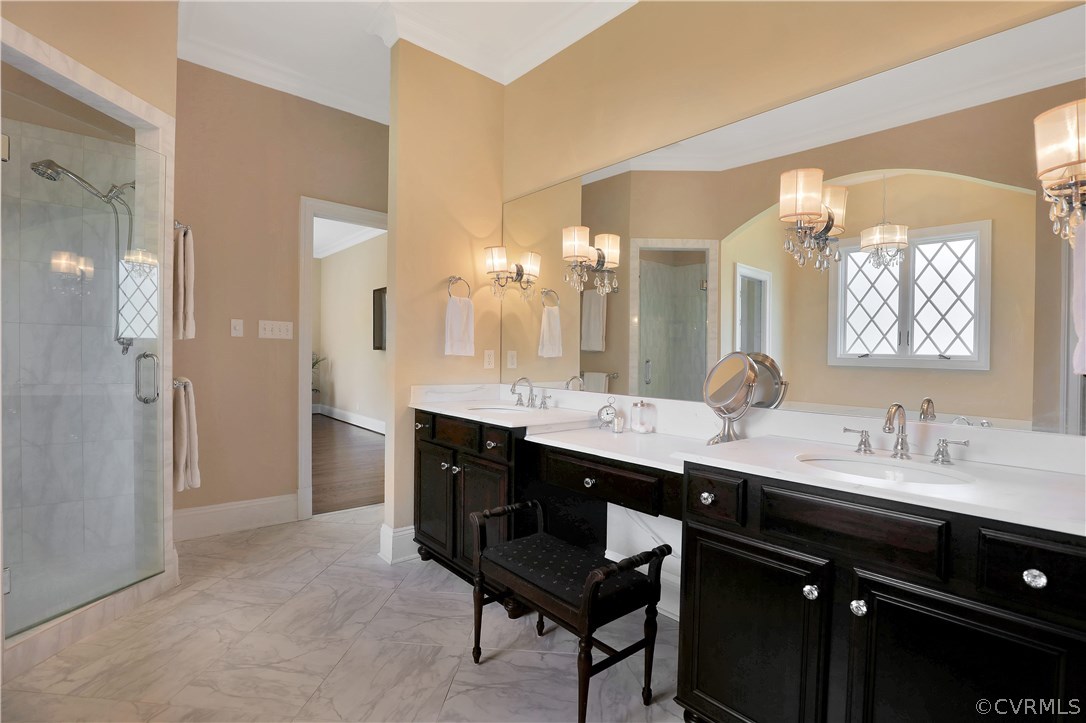 13430 Stonegate Road Midlothian, VA 23113 - Photo 21 of 35 a spacious bathroom with a granite countertop sink a mirror and a