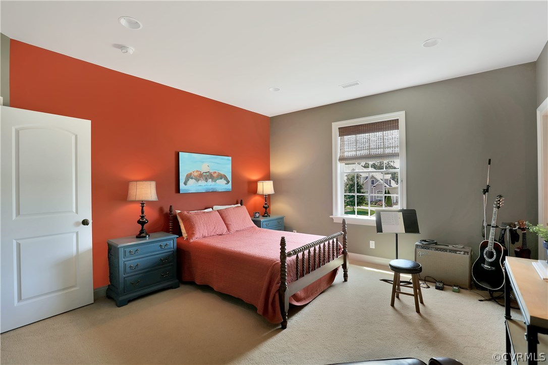 13430 Stonegate Road Midlothian, VA 23113 - Photo 29 of 35 a bedroom with a bed and a couch
