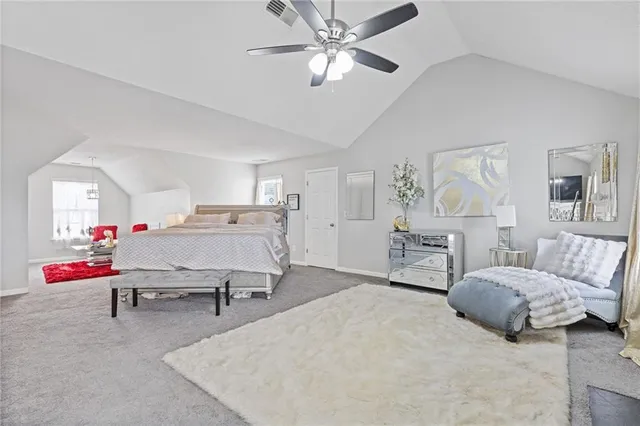 a bedroom with furniture and window