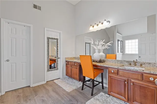 a view of a workspace with furniture