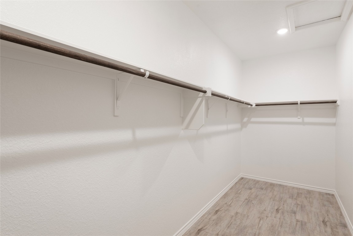 121 Bolivar Way, Unit 101 San Marcos, TX 78666 - Photo 18 of 33 a view of an empty walk in closet