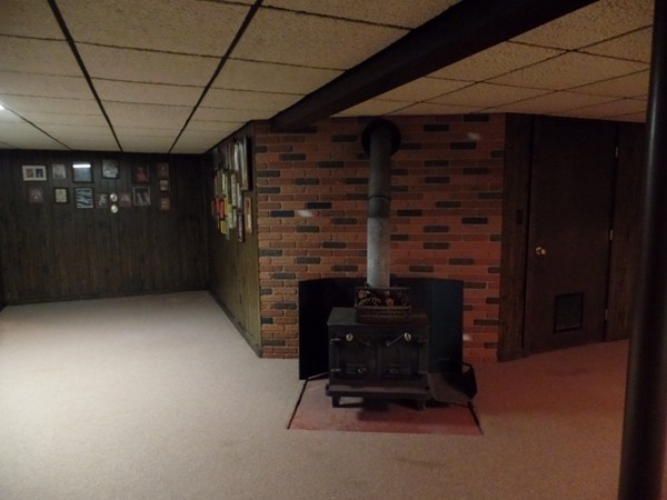 7 Coombs Road Rochester, MA 02770 - Photo 13 of 16 a room with fireplace and furniture