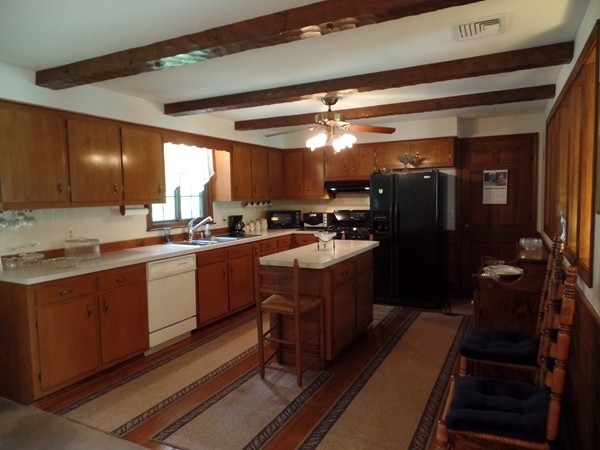 7 Coombs Road Rochester, MA 02770 - Photo 4 of 16 a kitchen with a sink appliances cabinets and furniture