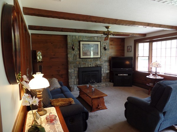 7 Coombs Road Rochester, MA 02770 - Photo 6 of 16 a living room with furniture and a fireplace