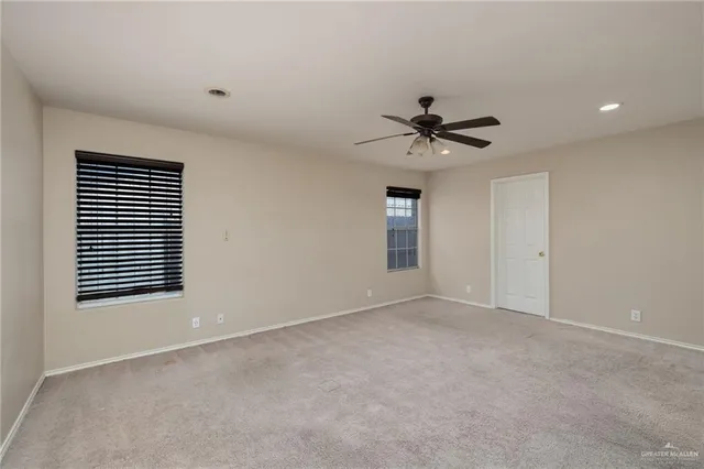 a kitchen with stainless steel appliances granite countertop a sink and dishwasher a stove top oven with wooden floor