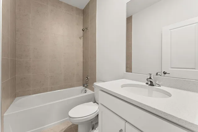 a bathroom with a sink toilet and a bathtub